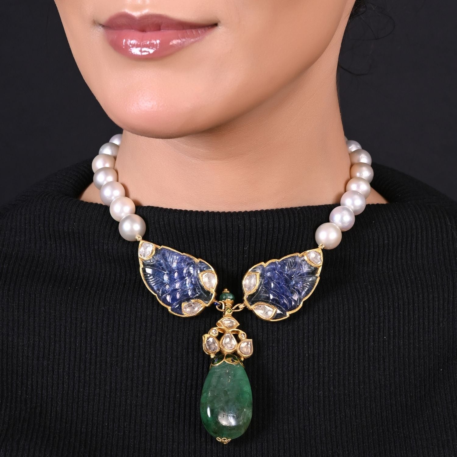 The Tanzanite Wing Pendant